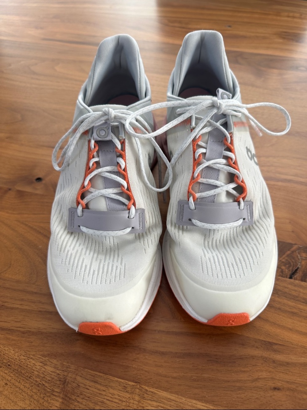 On Running Women's White and Orange Athletic Shoes